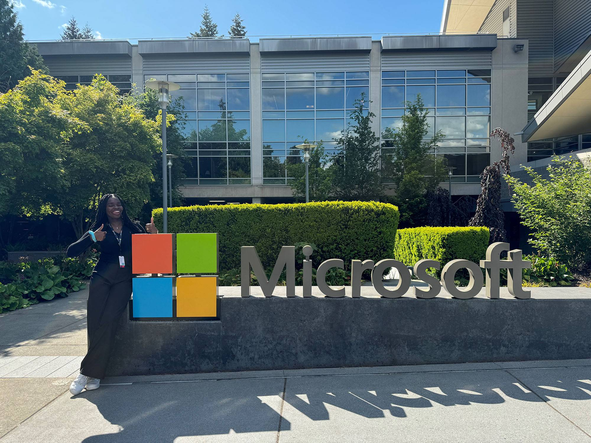 Image of Serena in front of the Microsoft sign